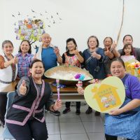 莊秋桂與許智傑捐贈338個母親節蛋糕給門諾基金會
