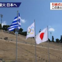 奧運聖火交接日本堅持照常辦賽事 副首相：奧運每逢40年必出事