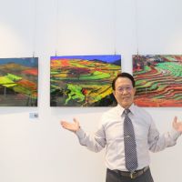 退休校長跨界攝影　賴明杭綠繡眼獲國際獎項