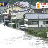 日本暴雨下不停！7旬嬤大水中緊抱木樁 4小時獲救